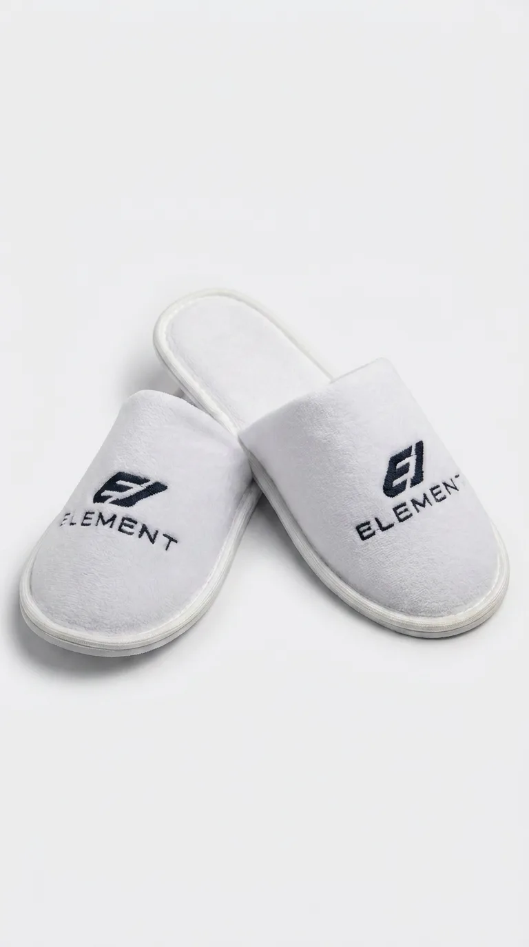 Велюровые тапочки с вышивкой для компании Element